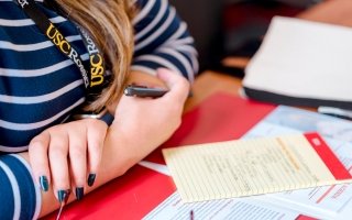 USC-rossier-sept19-PPS-cohort-28.jpg Student taking notes